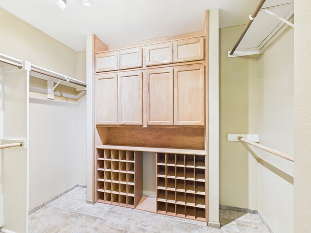 bedroom featuring ornamental molding, a wall mounted AC, ceiling fan, and dark hardwood / wood-style flooring