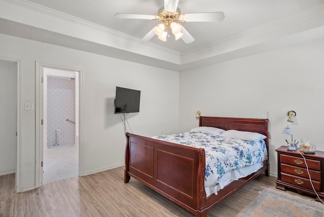 bedroom with ceiling fan, baseboards, crown molding, and light wood-style floors