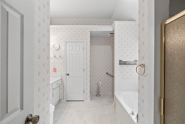 full bathroom with a bath, tile patterned flooring, wallpapered walls, and vanity