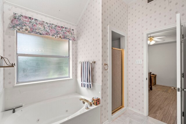 bathroom with shower with separate bathtub, lofted ceiling, wood-type flooring, ceiling fan, and ornamental molding