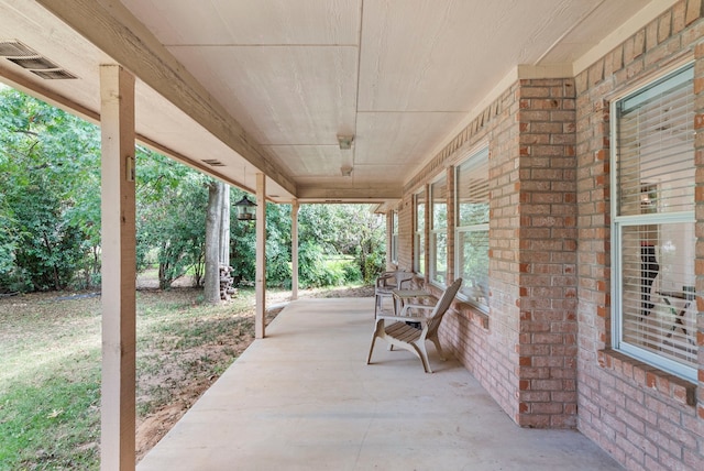 view of patio featuring visible vents