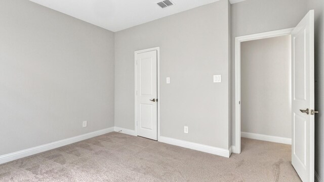 interior space with light colored carpet