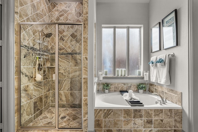 bathroom with shower with separate bathtub