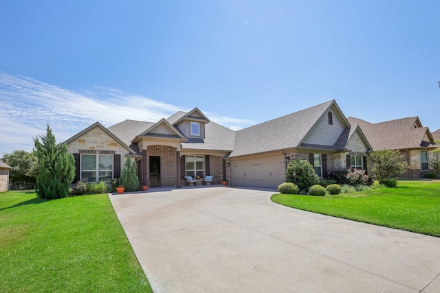 craftsman-style house with a front lawn and a garage