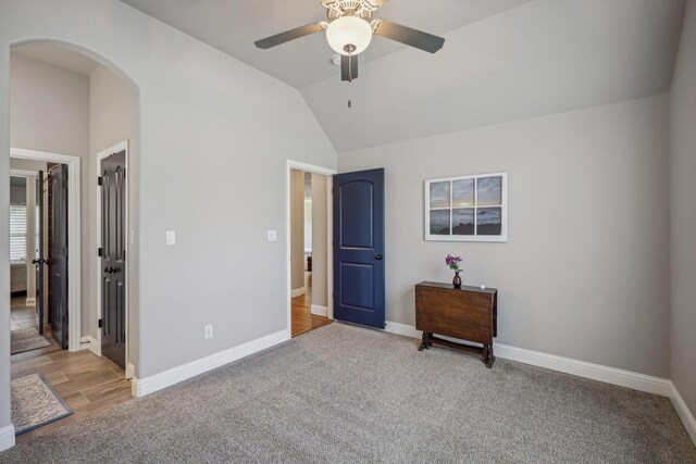 bedroom with vaulted ceiling, a closet, light wood-type flooring, and ceiling fan