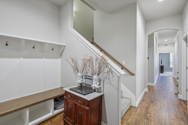 mudroom with hardwood / wood-style floors