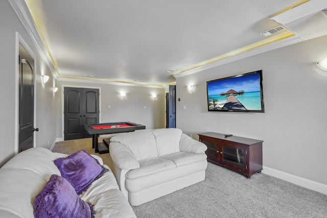 living room with carpet and crown molding