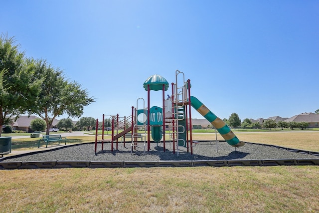 view of jungle gym featuring a yard