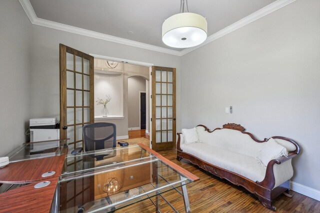 office featuring ornamental molding, dark hardwood / wood-style floors, and french doors