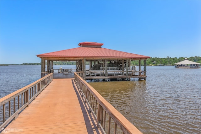 view of dock with a water view