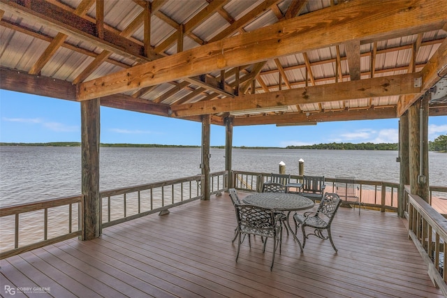 dock area with a gazebo and a water view