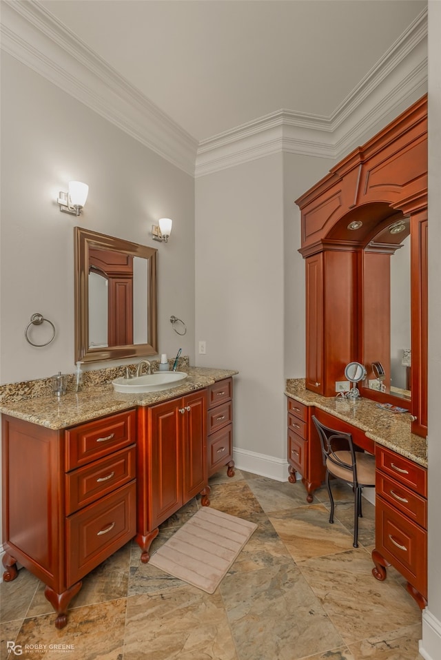 bathroom with vanity and ornamental molding