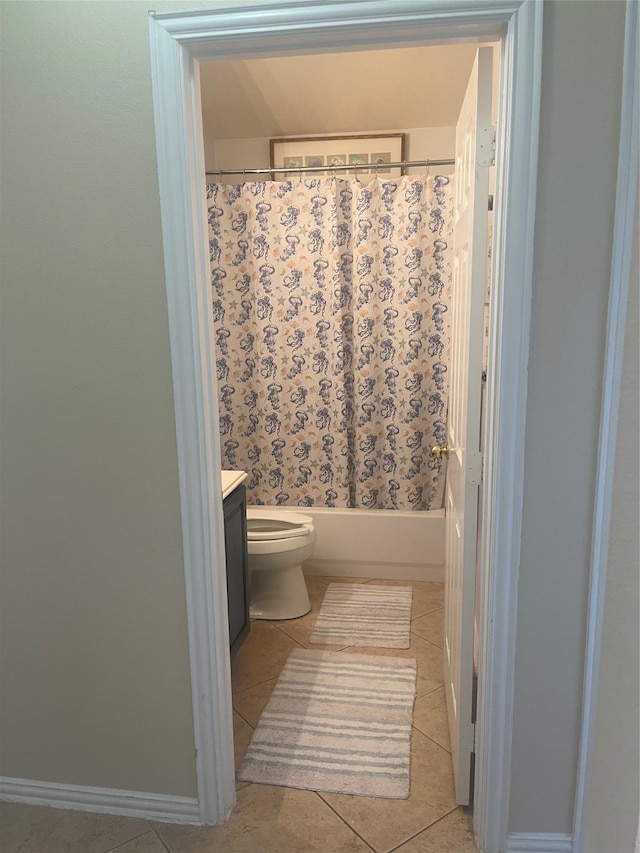 full bathroom featuring vanity, toilet, tile patterned floors, and shower / bath combo