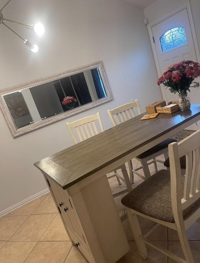 dining room featuring light tile patterned floors