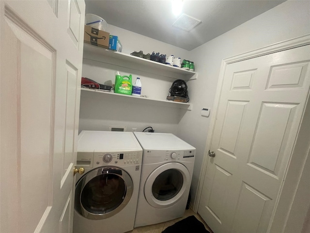 laundry room featuring washer and dryer