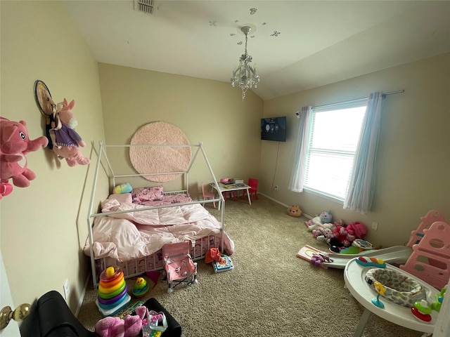 bedroom featuring lofted ceiling and carpet