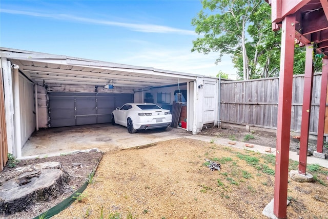 garage featuring a carport