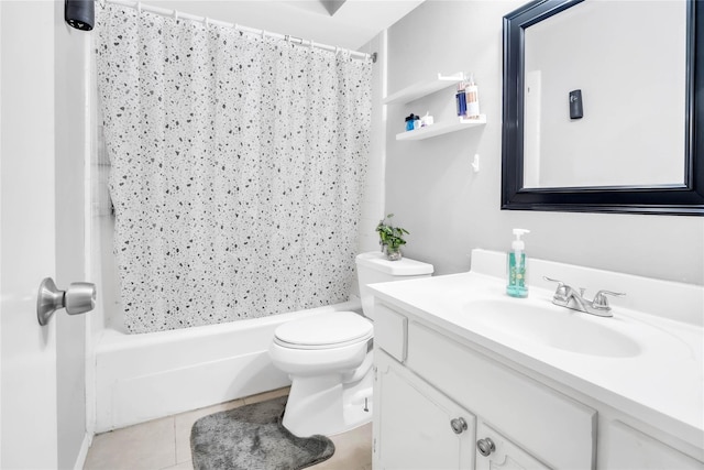 full bathroom featuring shower / tub combo, tile patterned flooring, vanity, and toilet