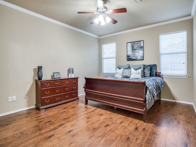 bedroom with ceiling fan, ornamental molding, and hardwood / wood-style flooring