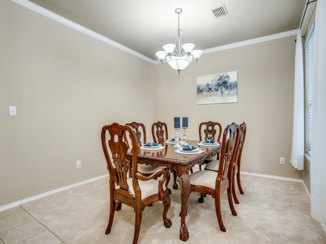 carpeted dining room featuring crown molding and an inviting chandelier