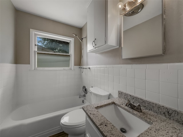 full bathroom with backsplash, toilet, tile walls, tub / shower combination, and vanity