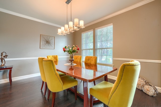 dining room with a chandelier, dark hardwood / wood-style flooring, and crown molding