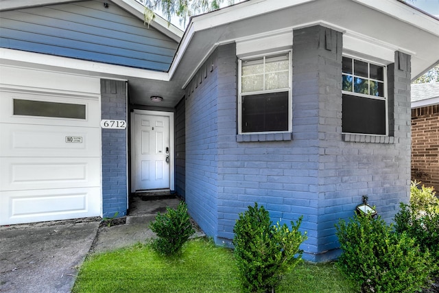 entrance to property with a garage