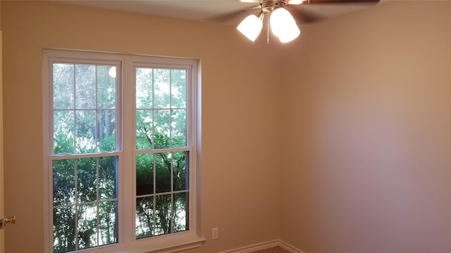 doorway to outside with ceiling fan