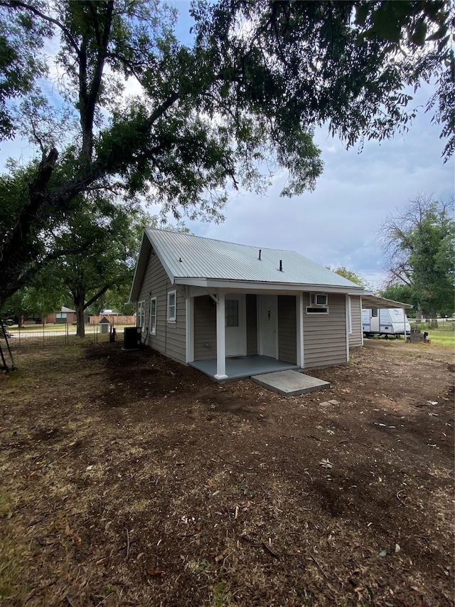 back of house featuring a patio area