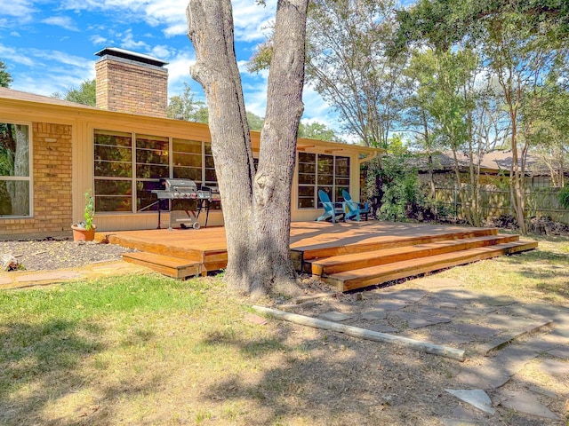 view of yard with a wooden deck