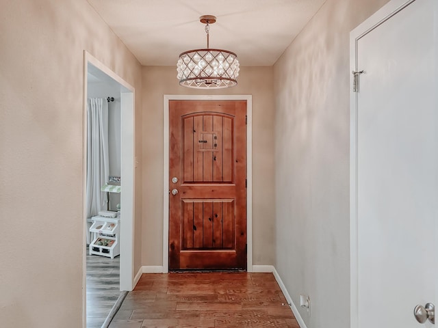 doorway to outside featuring hardwood / wood-style flooring