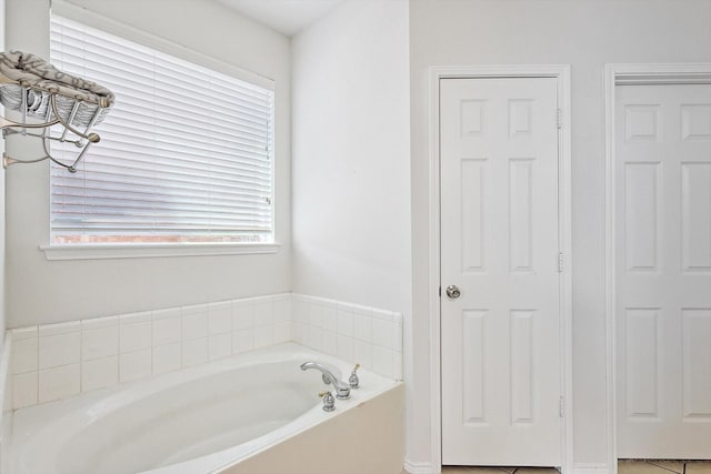 bathroom featuring a garden tub