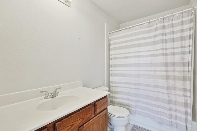 full bath featuring toilet, shower / tub combo with curtain, and vanity