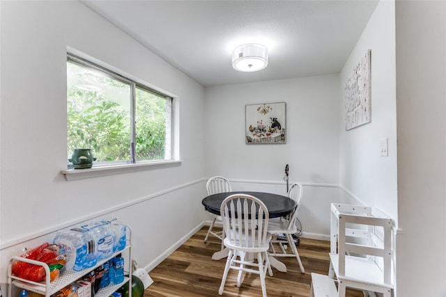 dining space featuring hardwood / wood-style flooring