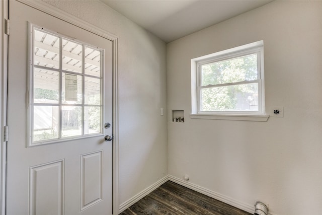 doorway featuring dark wood-type flooring