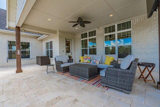 view of patio featuring an outdoor living space and ceiling fan