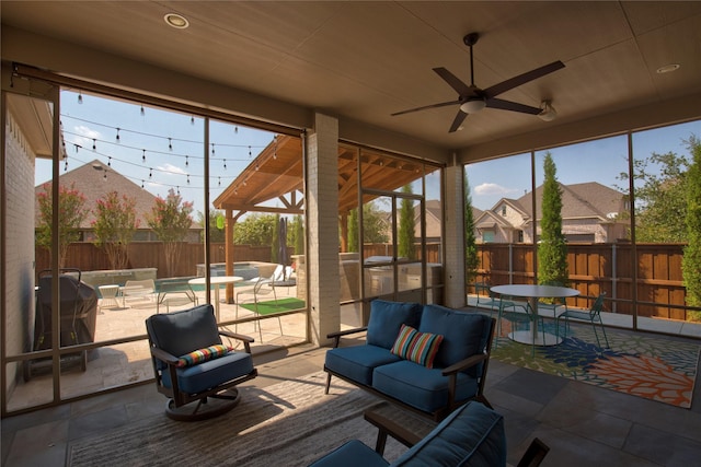3203 Prancer Way, Celina, TX 75009 - sunroom featuring a ceiling fan, area for grilling, and outdoor lounge area
