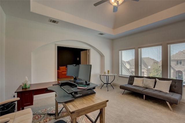 3203 Prancer Way, Celina, TX 75009 - home office with visible vents, arched walkways, a ceiling fan, and light carpet
