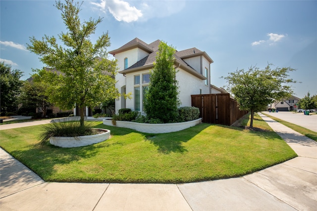 view of home's exterior featuring a lawn