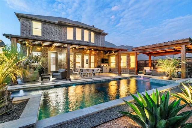 view of swimming pool featuring an outdoor living space and a patio