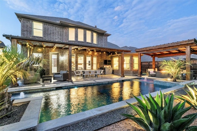 view of swimming pool featuring a fenced in pool, outdoor lounge area, fence, and a patio