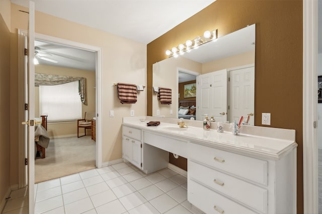 bathroom with vanity, ceiling fan, and tile patterned flooring