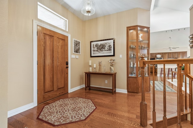 entryway featuring ceiling fan and dark hardwood / wood-style flooring