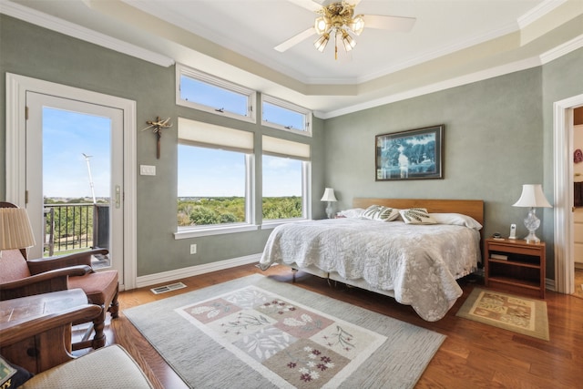 bedroom featuring access to exterior, ceiling fan, ornamental molding, and hardwood / wood-style floors