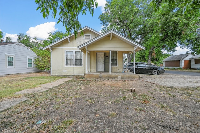 bungalow-style home featuring a porch