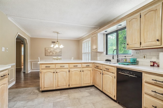 kitchen featuring dishwasher, decorative light fixtures, a chandelier, kitchen peninsula, and tasteful backsplash