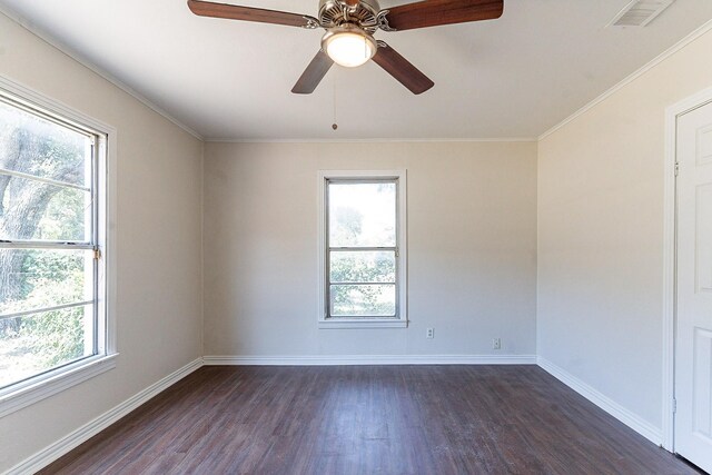 unfurnished room with ornamental molding, ceiling fan, and dark hardwood / wood-style floors