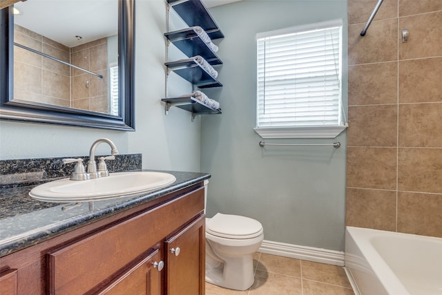 full bathroom featuring toilet, vanity, tile patterned floors, and tiled shower / bath