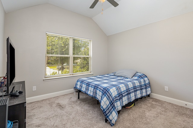 carpeted bedroom with lofted ceiling and ceiling fan