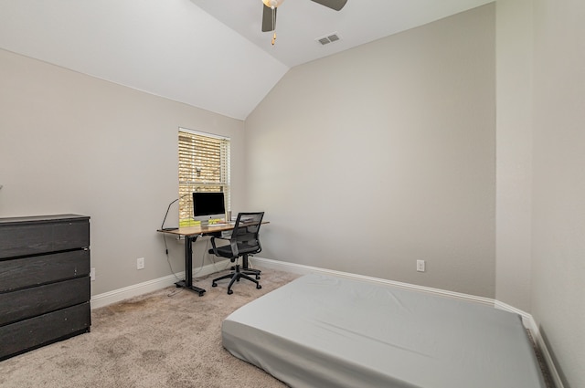 carpeted bedroom featuring ceiling fan and vaulted ceiling